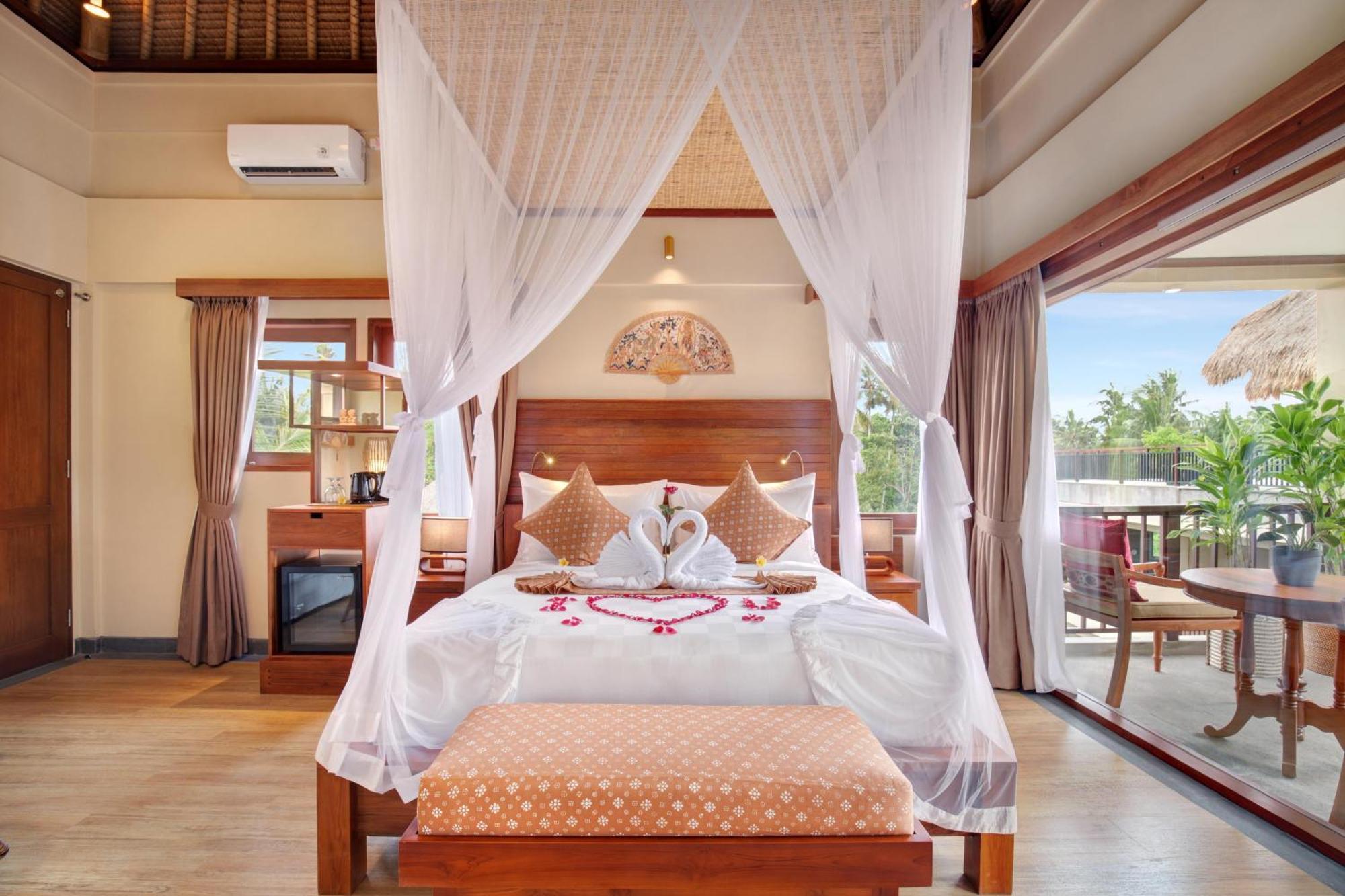 Ubud Nyuh Bali Resort & Spa Oda fotoğraf A bedroom at the resort
